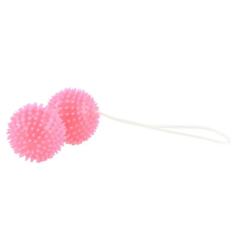 Boules de geisha texturées roses avec pointes et ficelle, pour renforcement pelvien débutantes, confort et sécurité.