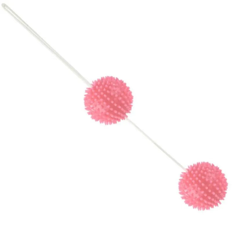 Boules de geisha texturées roses avec pointes, ficelle de retrait, pour renforcement pelvien débutantes.