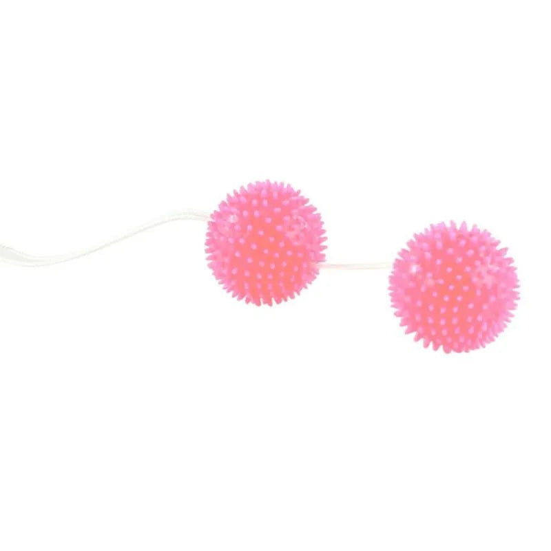 Boules de geisha texturées roses avec pointes et ficelle, pour renforcement pelvien et stimulation débutantes.