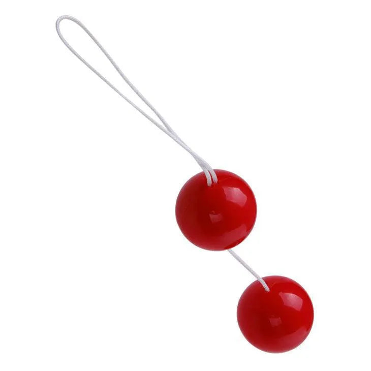 Boules Geisha rouges en TPR avec cordon blanc, pour stimulation vaginale et renforcement du plancher pelvien.
