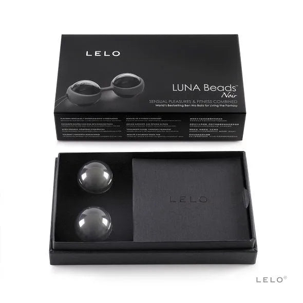 Boules de Kegel noires en silicone dans coffret cadeau, design ergonomique, avec pochette satinée et manuel inclus.