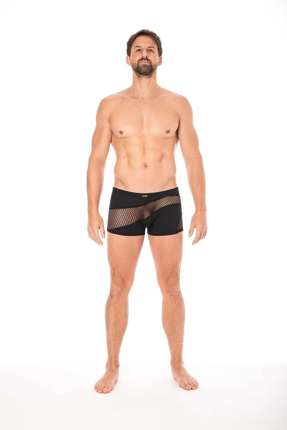 Boxer noir élasthanne, rayures fines, opaque et transparent, élégant et chic, confort optimal, homme debout.