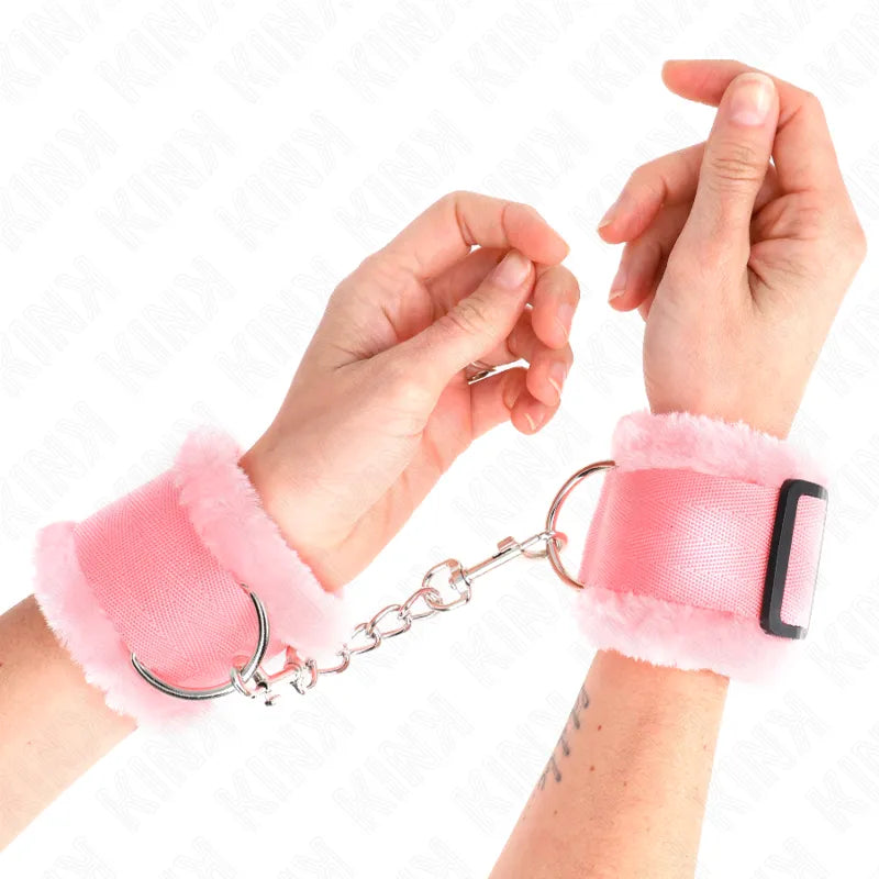Bracelets BDSM en cuir véritable rose, ajustables, avec boucles métalliques et doublure douce pour confort et robustesse.