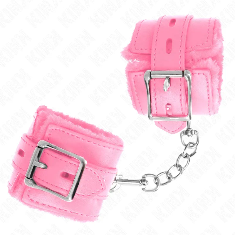 Bracelets BDSM rose en cuir végétalien avec rembourrage intérieur, chaîne métallique, design moderne et finitions soignées.