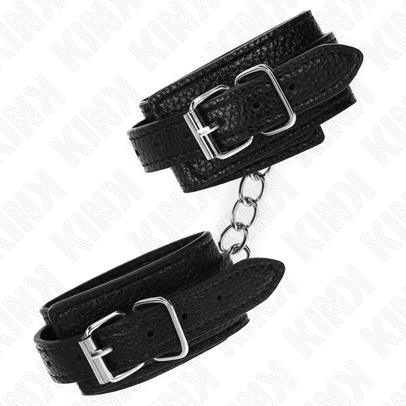 Bracelet BDSM cuir noir ajustable avec boucles solides, rembourré pour confort, design élégant et robuste.