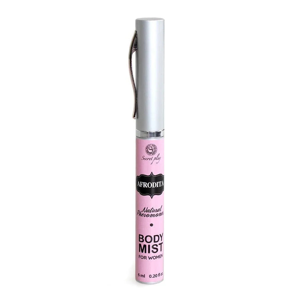 Flacon rose de brume corporelle aphrodisiaque à la truffe, hydratante et sensorielle, format portable avec bouchon argenté.