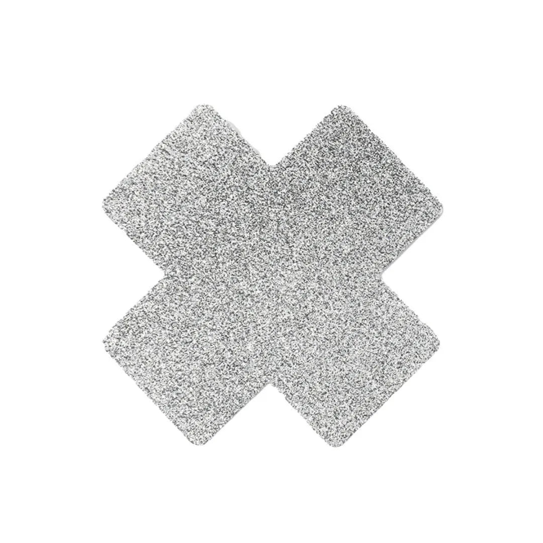 Cache-tétons croix pailletée blanche, adhésif, hypoallergénique, élégant et discret, idéal pour occasions spéciales.
