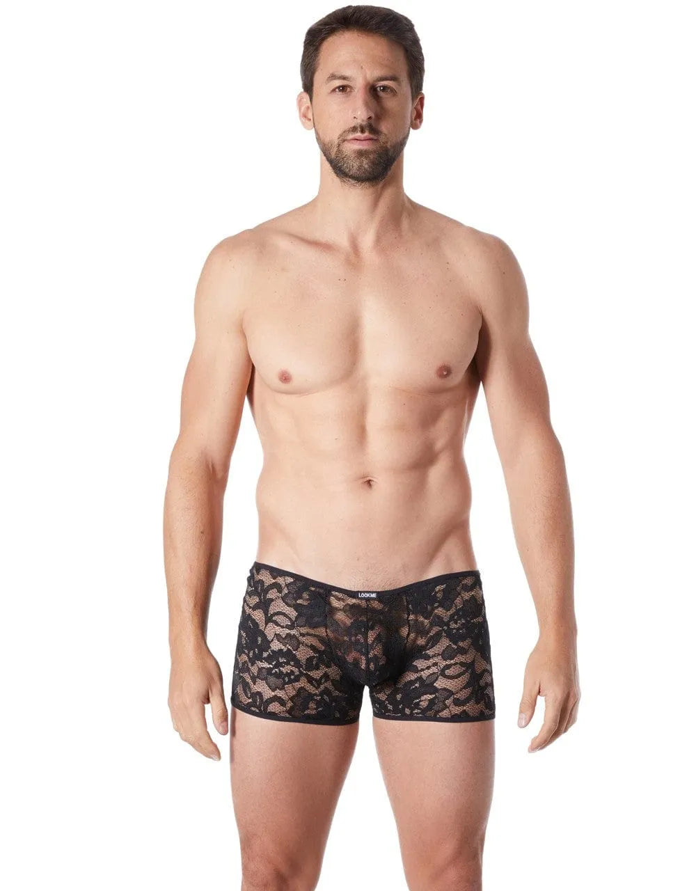 Boxer homme noir en dentelle florale transparente, ajusté, élégant et sensuel, mettant en valeur la silhouette masculine.