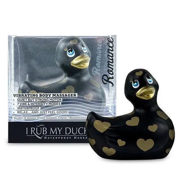 Canard vibromasseur noir avec motifs dorés, étanche, 7 modes, en silicone sans phtalates, dans une boîte Romance.