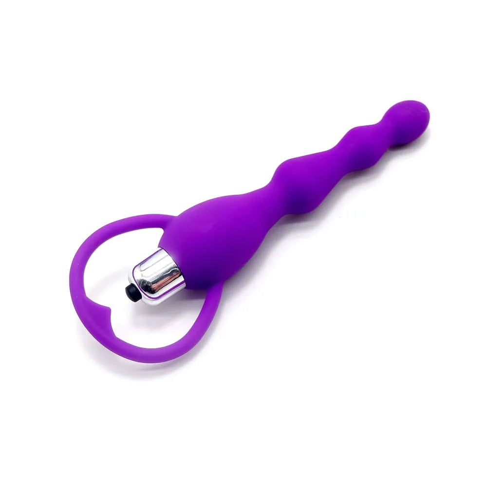 Chapelet anal violet ondulé vibrant avec poignée, silicone médical, 17 cm, stimulation intense, piles incluses.