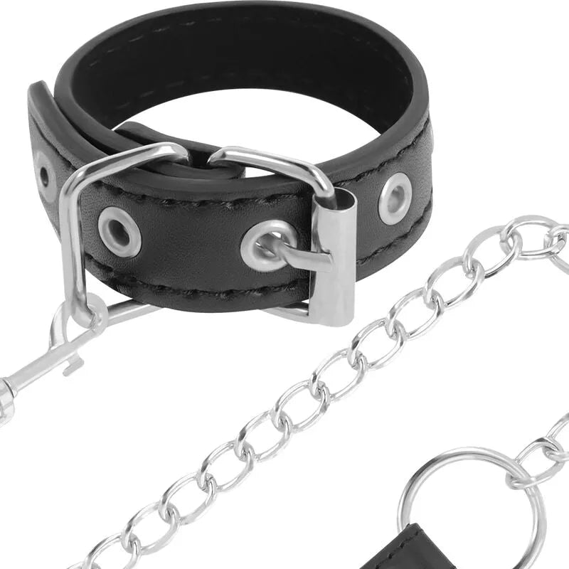 Anneau pénis BDSM en cuir vegan noir avec chaîne métal sans nickel, ajustable et sécurisé pour débutants et experts.