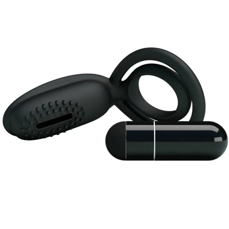 Anneau pénien silicone noir avec stimulateur clitoridien vibrant, ergonomique, ajustable, pour plaisir et érection prolongés.