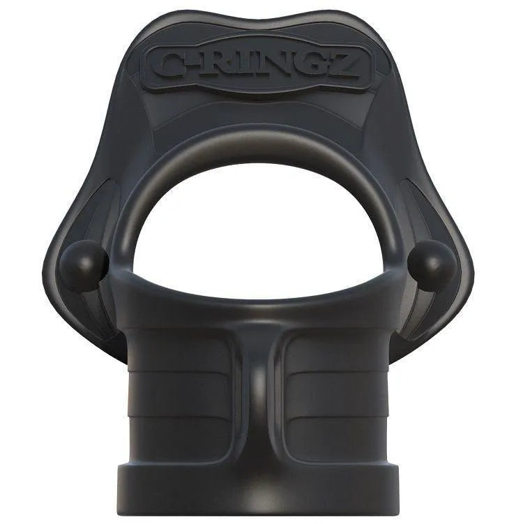 Anneau pénien noir en silicone médical, ergonomique, avec étireur testiculaire pour érections durables et confort optimal.