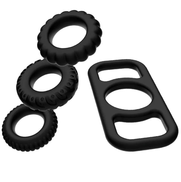Anneaux cockring silicone noir souple, formes ergonomiques, quatre tailles, stimulation intense, performance sexuelle.