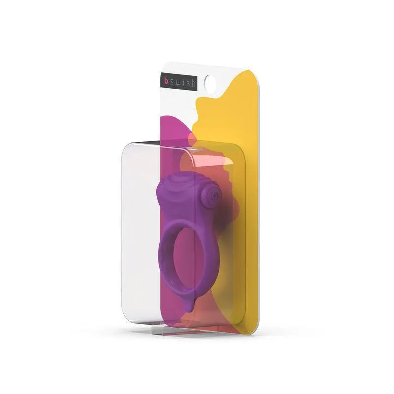 Anneau pénien violet en silicone strié vibrant, étanche, dans un emballage transparent et coloré.