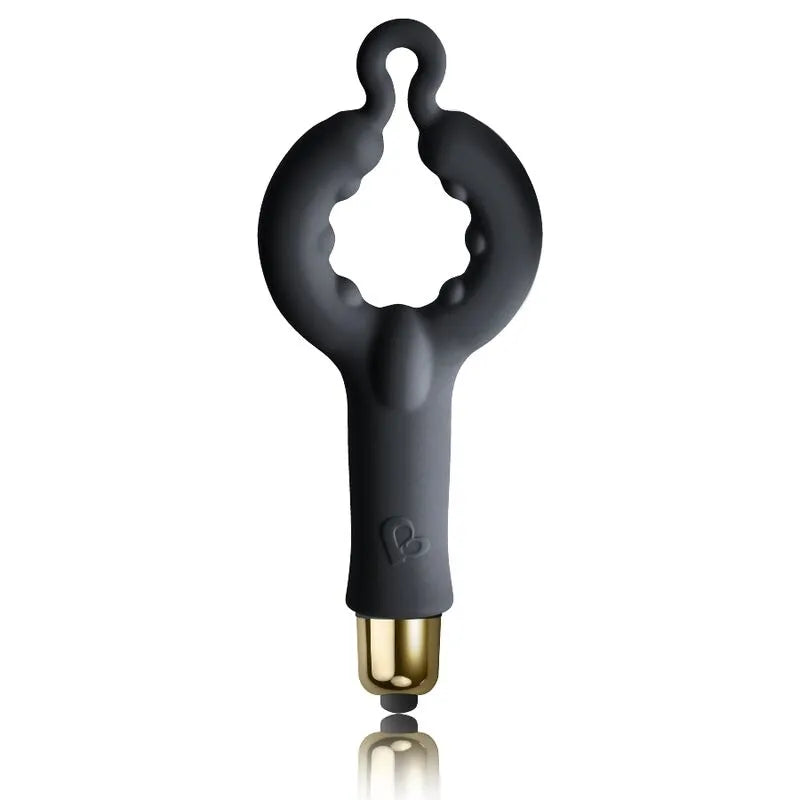 Anneau vibrant noir en silicone doux, forme ergonomique, avec stimulateur intégré et base dorée, pour plaisir partagé.