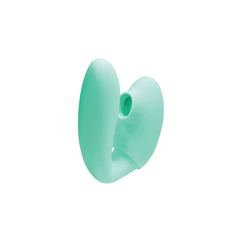 Anneau pénien vibrant Xocoon vert pastel, ergonomique, stimulation clitoridienne, silicone hypoallergénique, rechargeable.