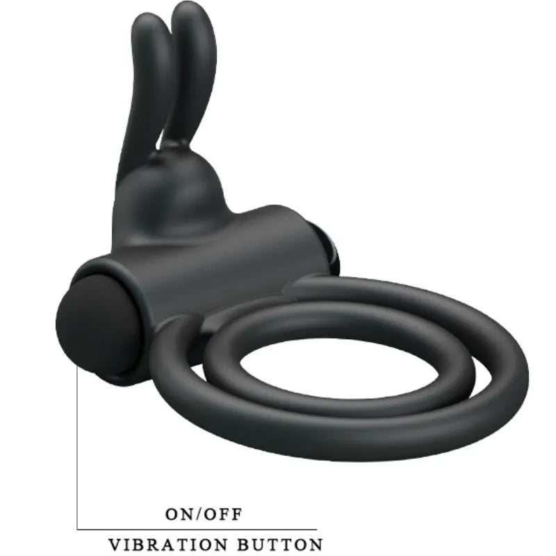 Anneau pénien vibrant noir en silicone avec double anneau et stimulateur clitoridien, étanche et silencieux.