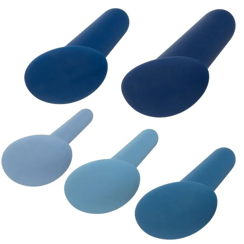 Coffret de 5 dilatateurs anaux en silicone bleu, formes progressives, base souple, ergonomiques et imperméables.