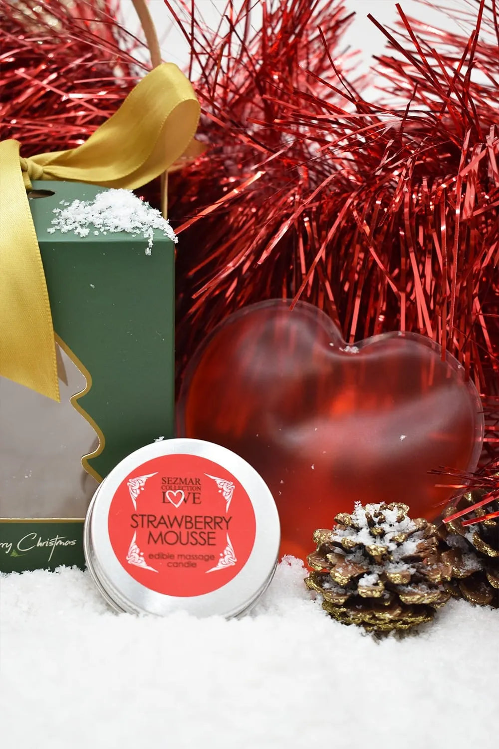 Coffret massage Noël avec huile fraise, cœur chauffant rouge, bougie naturelle, pétales rose, mini vibromasseur.