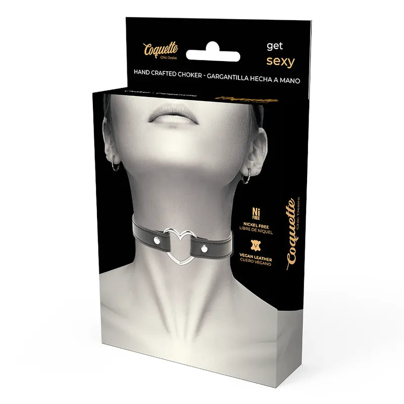 Collier cuir vegan noir élégant, ajustable, boutons-pression métal, hypoallergénique, chic et sensuel, sur boîte Coquette.