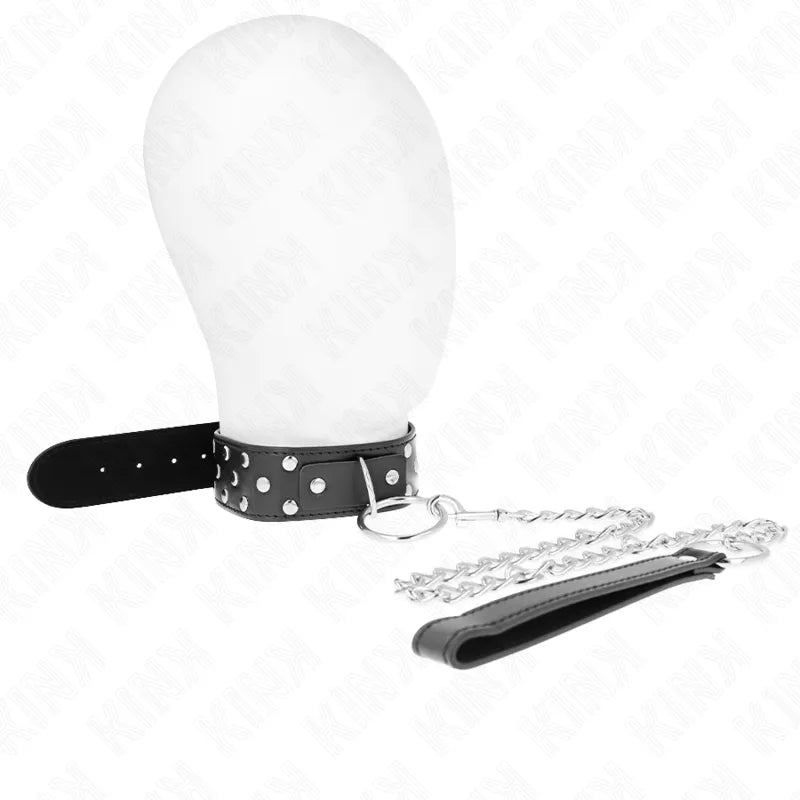 Collier BDSM noir en cuir végétalien avec boucles ajustables et chaîne, design raffiné pour élégance et domination.