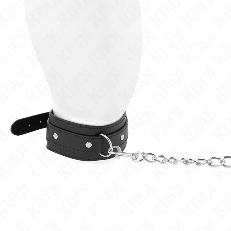 Collier BDSM cuir noir ajustable avec boucle métallique et chaîne, design élégant et raffiné pour confort et durabilité.
