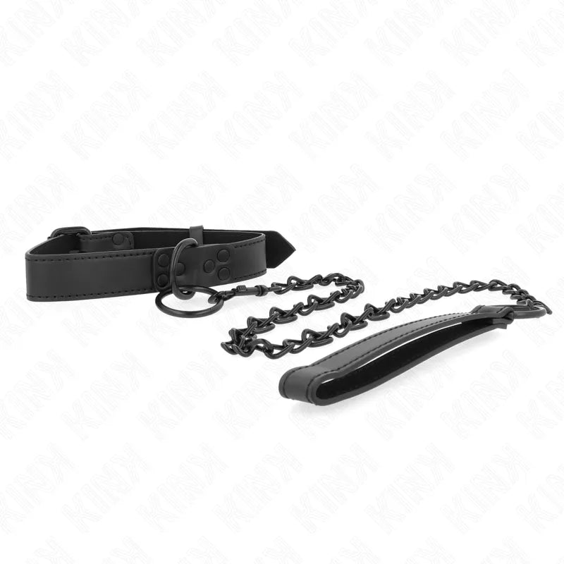 Collier et laisse BDSM noirs en cuir élégant, avec chaîne métallique, ajustables et sophistiqués pour soumission stylée.