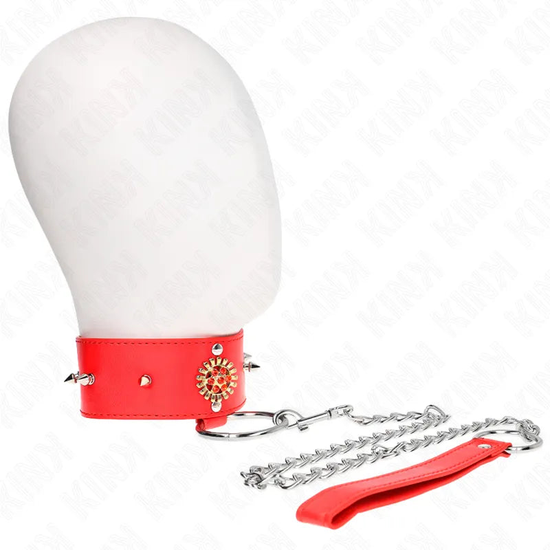 Collier et laisse BDSM en cuir rouge, design élégant et sophistiqué, avec détails métalliques et chaîne argentée.