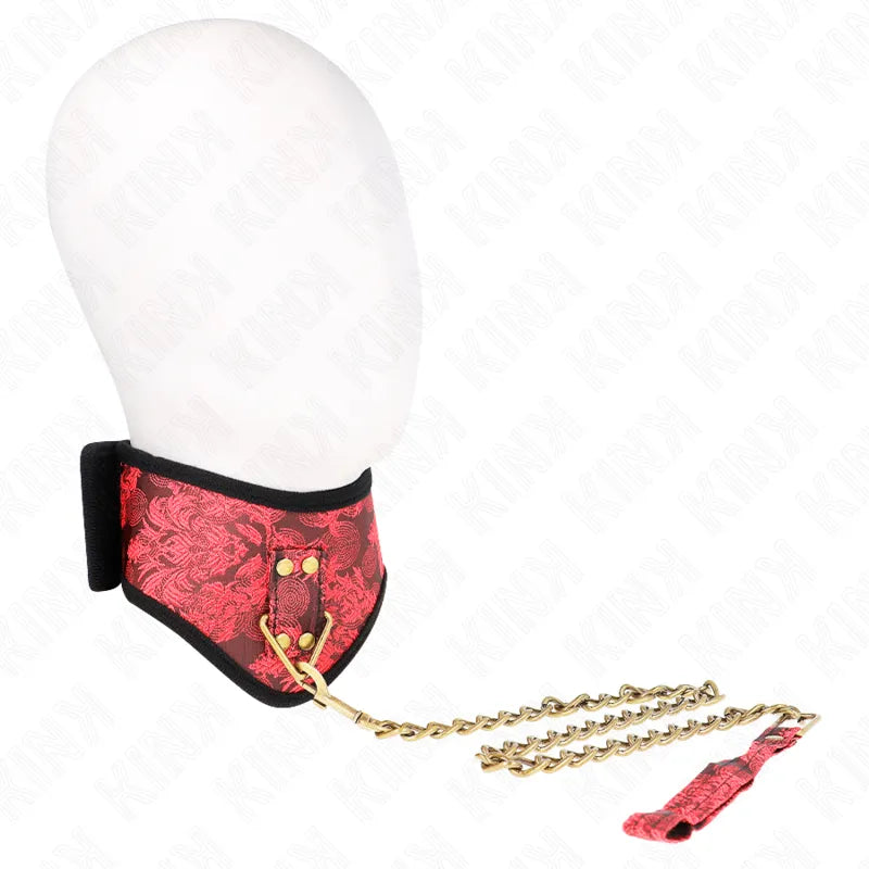 Collier BDSM rouge en cuir végétalien, motifs élégants, boucles métalliques dorées, chaîne attachée, design raffiné.