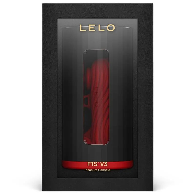 Console de plaisir LELO F1S V3 rouge en silicone liquide, design ergonomique, dans un emballage noir élégant.