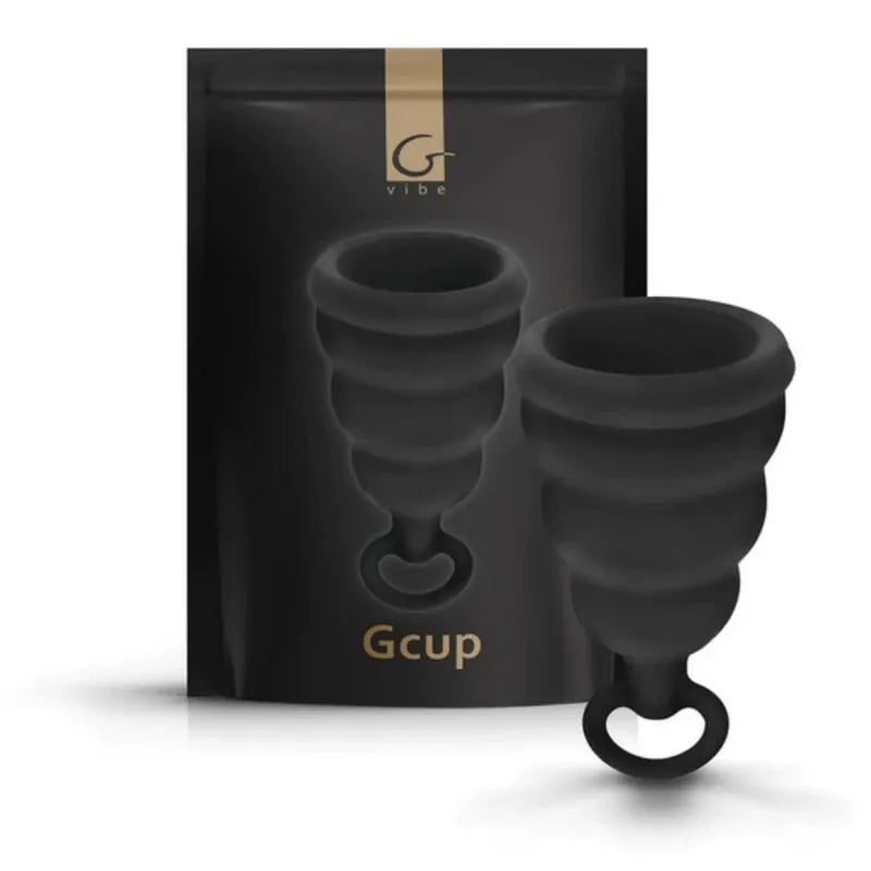 Coupe menstruelle noire en silicone avec clapet anti-retour, forme en cloche, accompagnée de son emballage élégant.