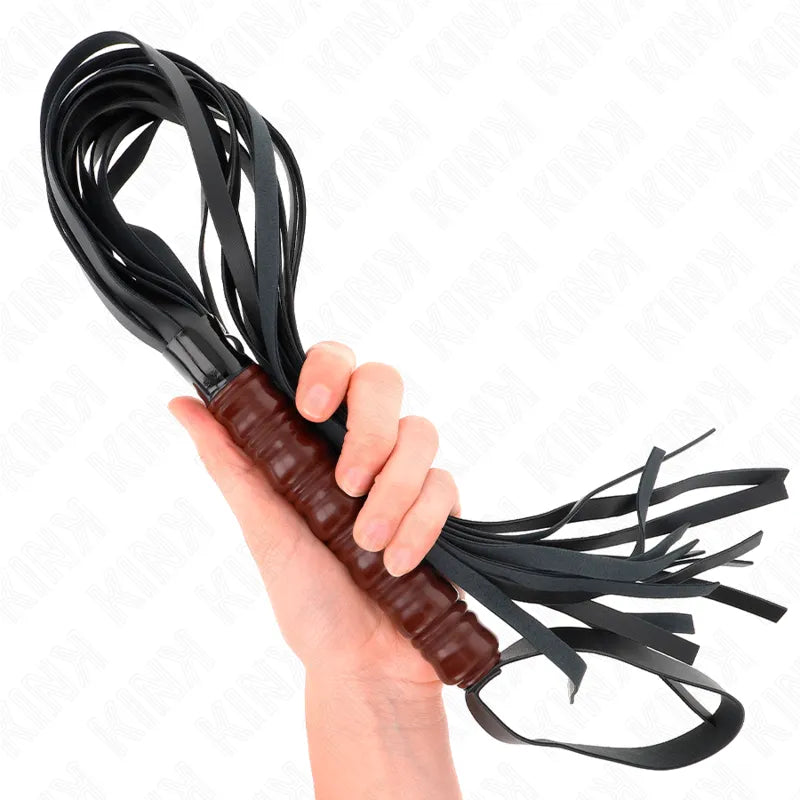 Cravache en cuir noir avec poignée ergonomique marron, design élégant pour jeux BDSM, robustesse et flexibilité.