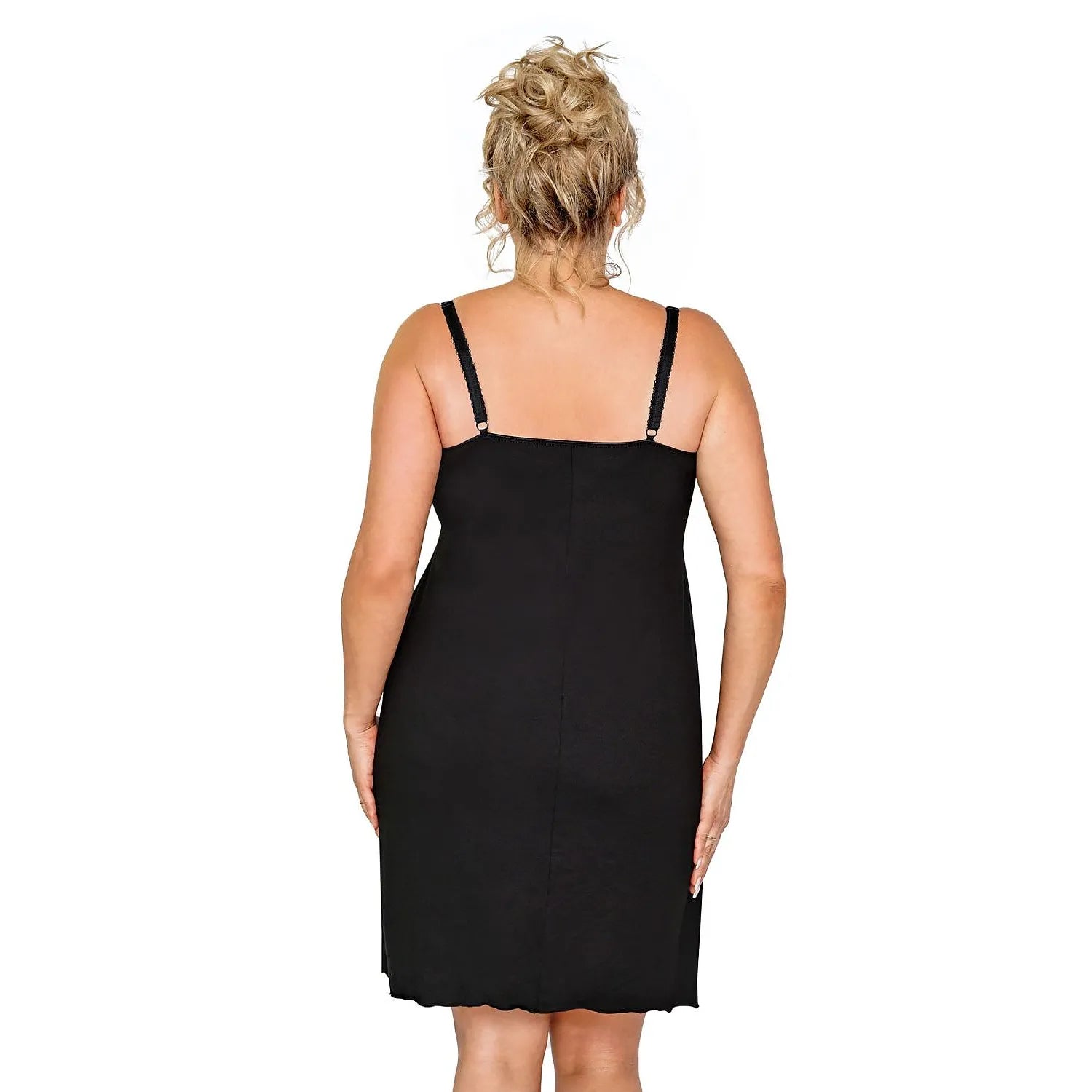 Chemise de nuit noire en dentelle avec roses fuchsia, design élégant et ajusté, mettant en valeur la silhouette féminine.