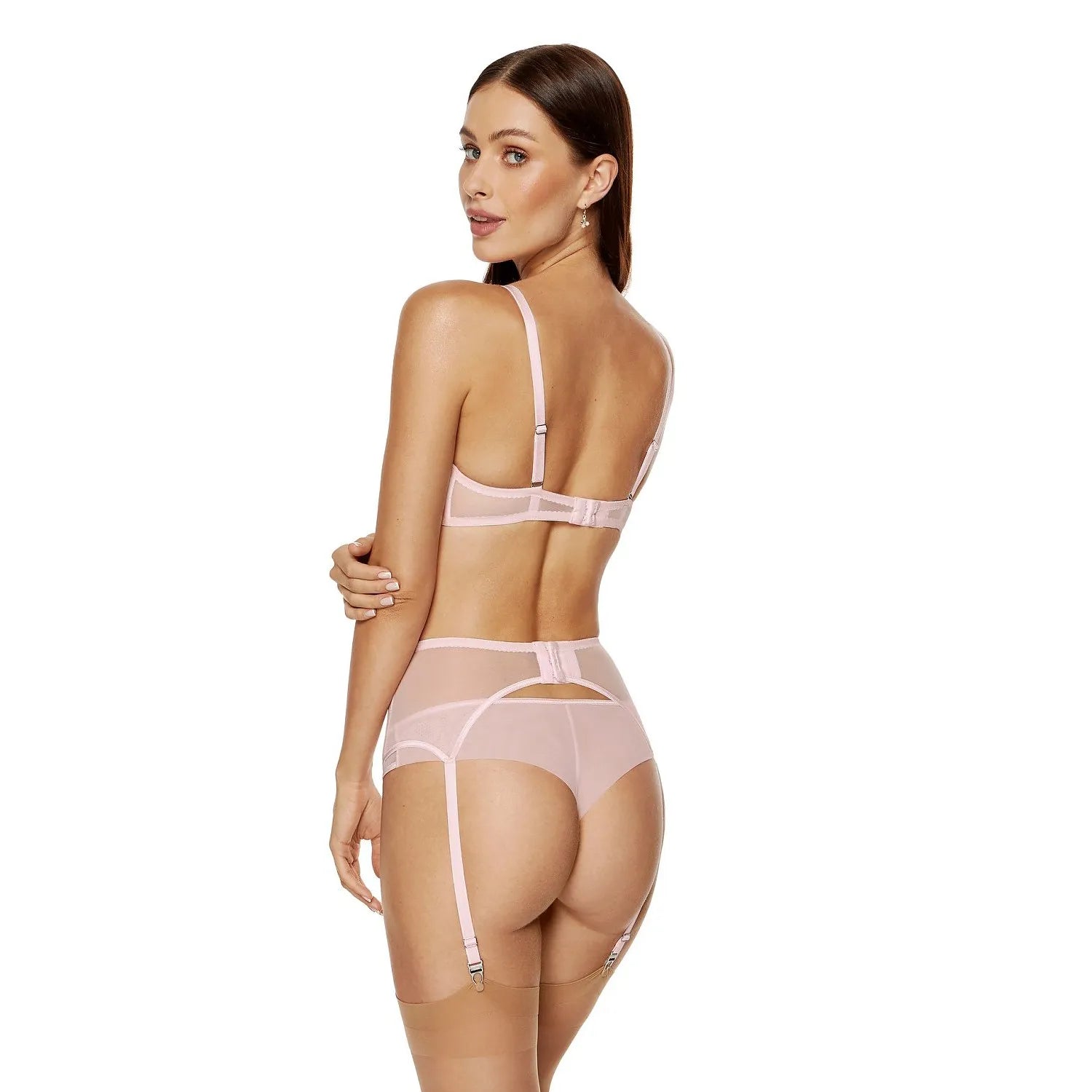 Ensemble lingerie rose pâle en dentelle florale avec soutien-gorge, porte-jarretelles et culotte, bretelles réglables.