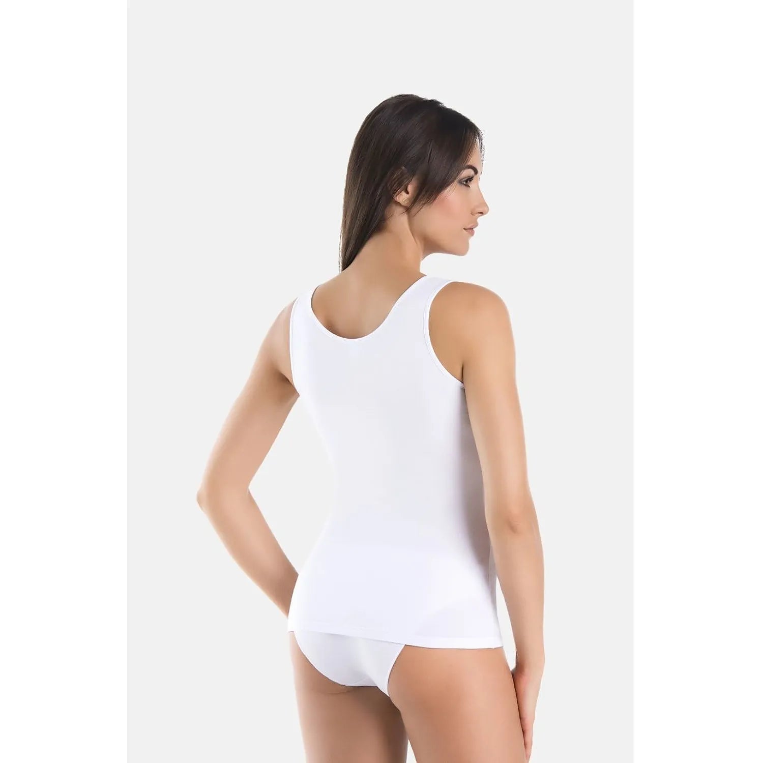 Ensemble chemisier blanc ajusté en coton et lycra, dos visible, confort et élégance, taille XS à XXL.
