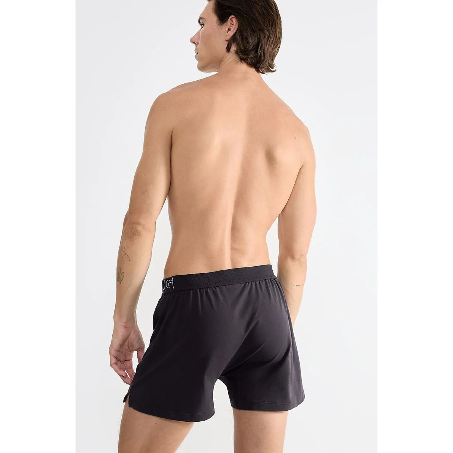 Boxer noir Sloggi pour homme, coupe classique, coton bio doux, élasticité optimale, confort et style moderne.