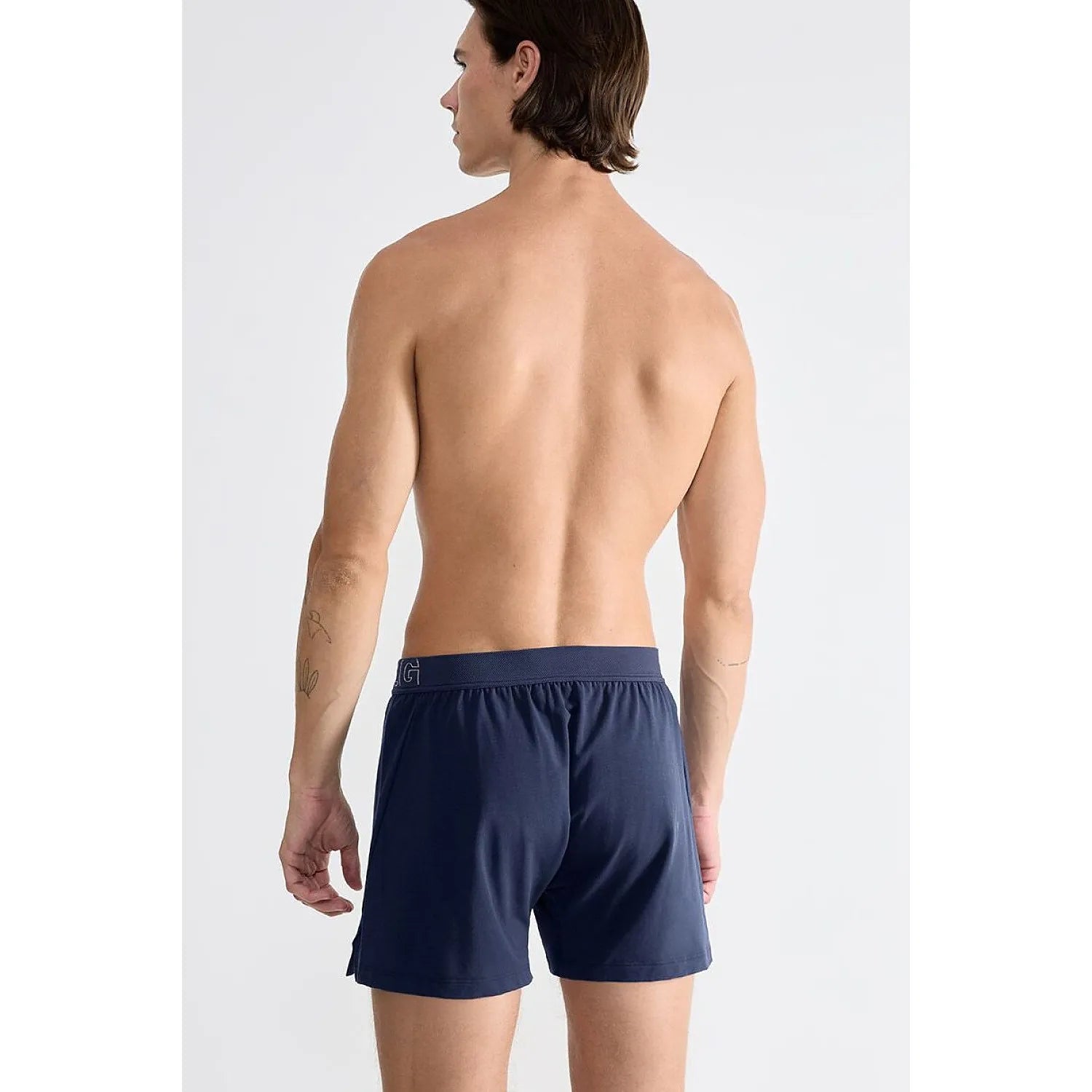 Boxer homme Sloggi bleu marine en coton bio, coupe classique, ajustement parfait, confort et respirabilité optimale.