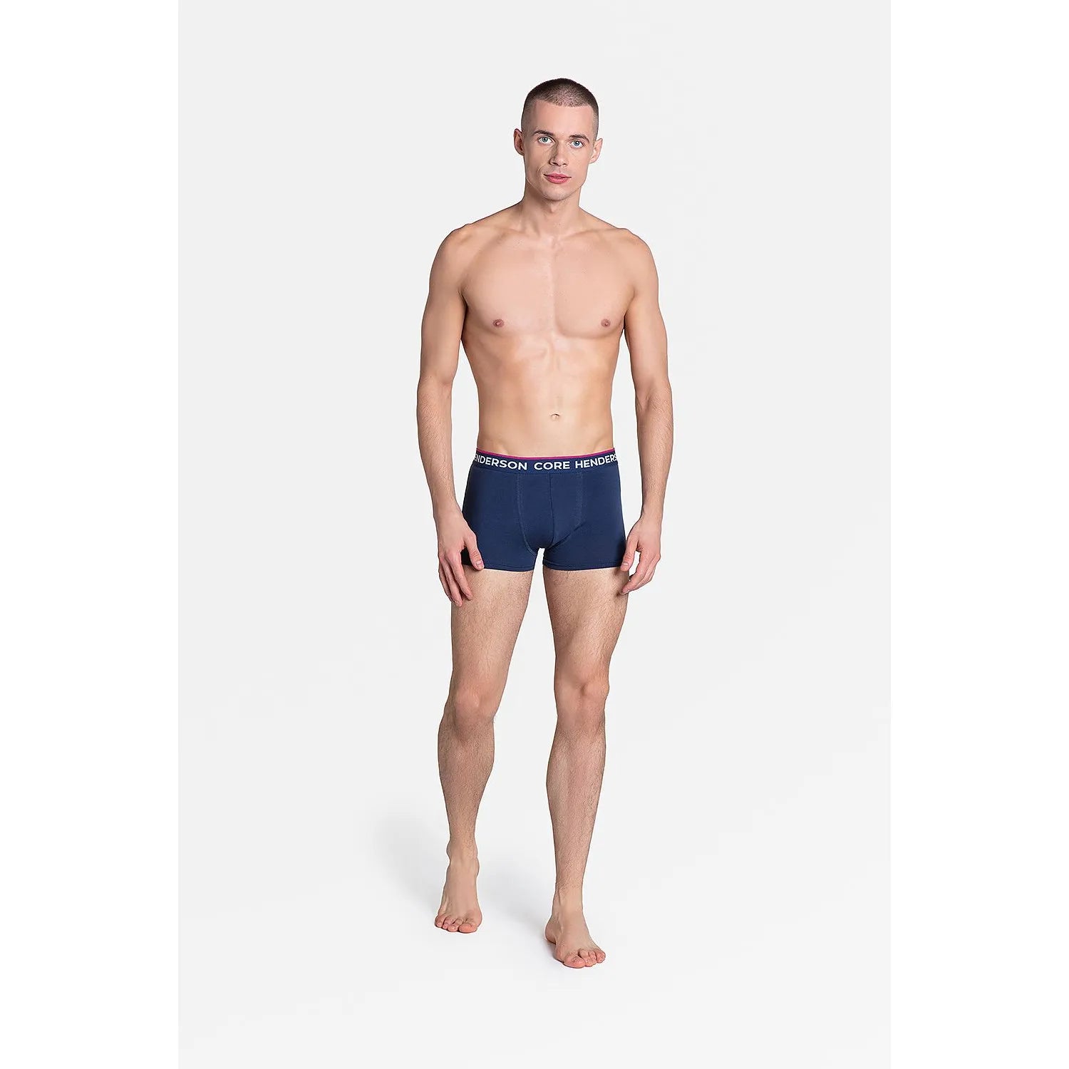 Boxer homme rose vif motifs noirs, coton élasthanne, maintien confort, ceinture élastique, coupe ajustée profilée.