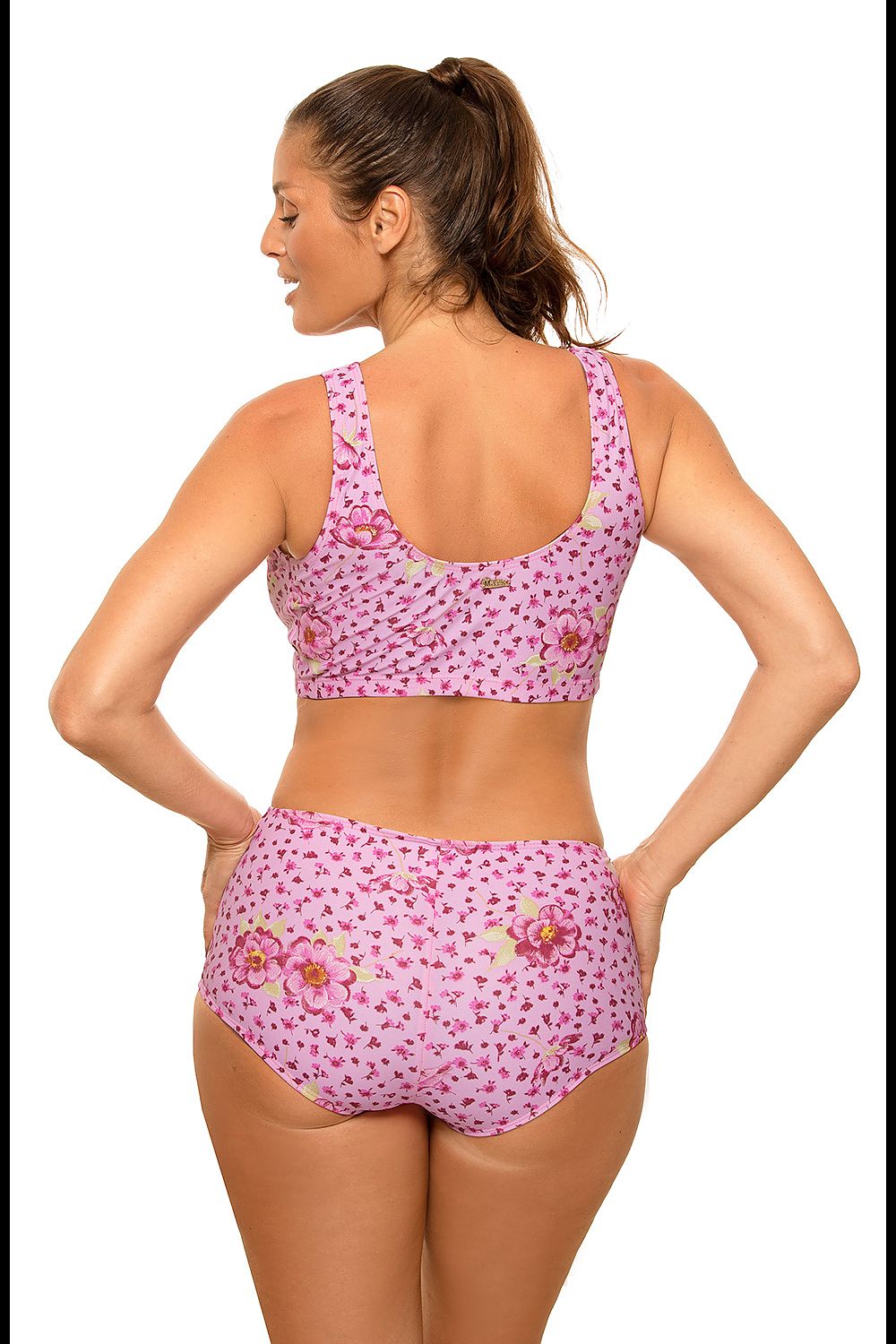 Maillot de bain deux pièces rose à motifs floraux, soutien-gorge top élastique, culotte haute, tissu Carvico Tessuti.