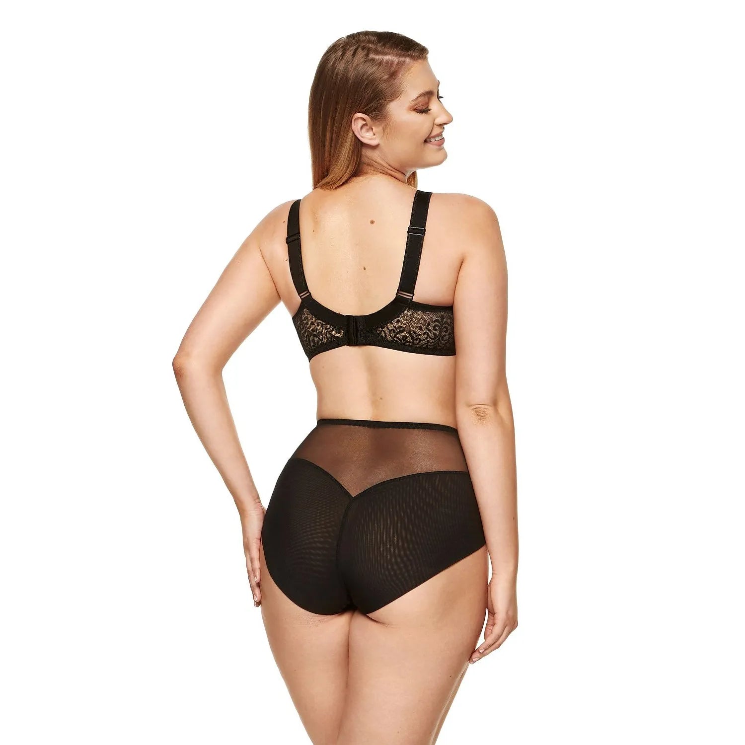 Ensemble lingerie noire en dentelle florale, soutien-gorge à armatures, culotte taille haute, tissu transparent.
