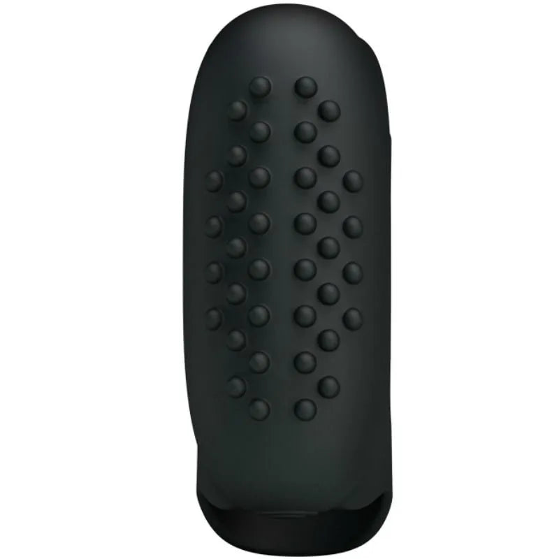 Dé à coudre vibrant en silicone noir texturé, ergonomique et discret, offrant une stimulation sensorielle intense.