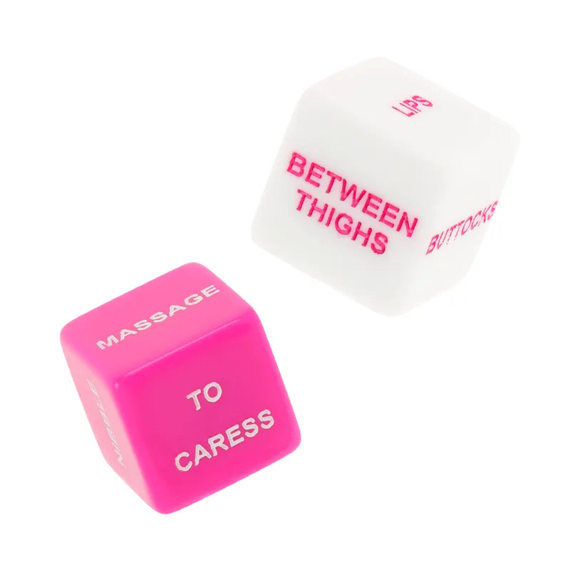 Dés érotiques Moressa en résine, rose et blanc, sans phthalates, design ergonomique, inscriptions sensuelles en anglais.