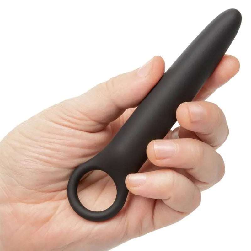 Dilatateur en silicone noir, ergonomique, avec boucle pour doigt, tenu en main, pour dilatation progressive hypoallergénique.