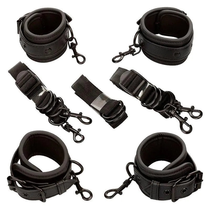 Dispositifs de retenue lit noirs, boucles sécurisées, poignets rembourrés, anneaux pivotants, ajustables et robustes.