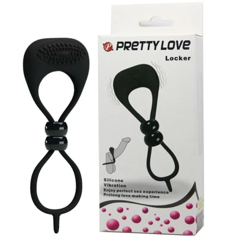 Double anneau vibrant noir en silicone avec balle vibrante, pour pénis et testicules, sur fond de boîte illustrée.