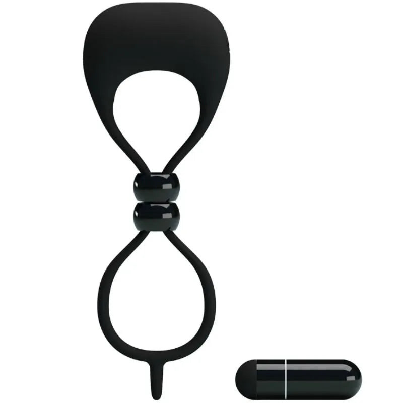 Anneau vibrant noir en silicone avec balle vibrante intégrée, conçu pour pénis et testicules, améliore l'expérience intime.