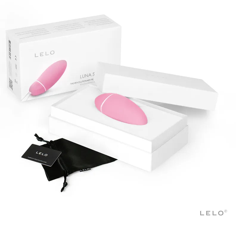 Appareil Kegel intelligent rose en silicone, forme ovale, avec boîte blanche, capteurs tactiles, vibrations progressives.