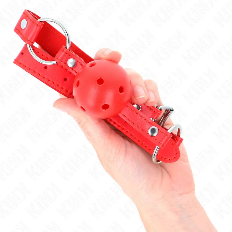 Gag boule BDSM rouge en silicone doux avec trous, sangle ajustable en cuir, design ergonomique et discret.