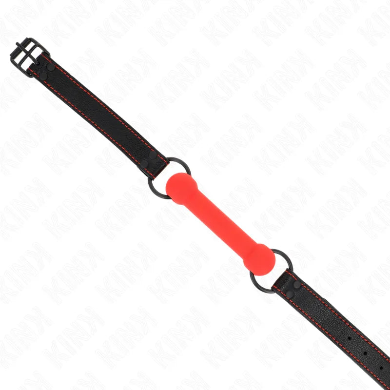 Gag boule BDSM en silicone rouge avec sangle noire ajustable, ergonomique et hypoallergénique pour confort et sécurité.